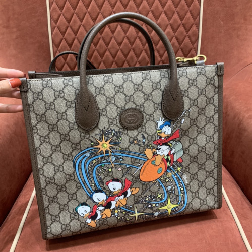 구찌 X 디즈* 도널* 덕 토트백 648134 2N0AT 8679